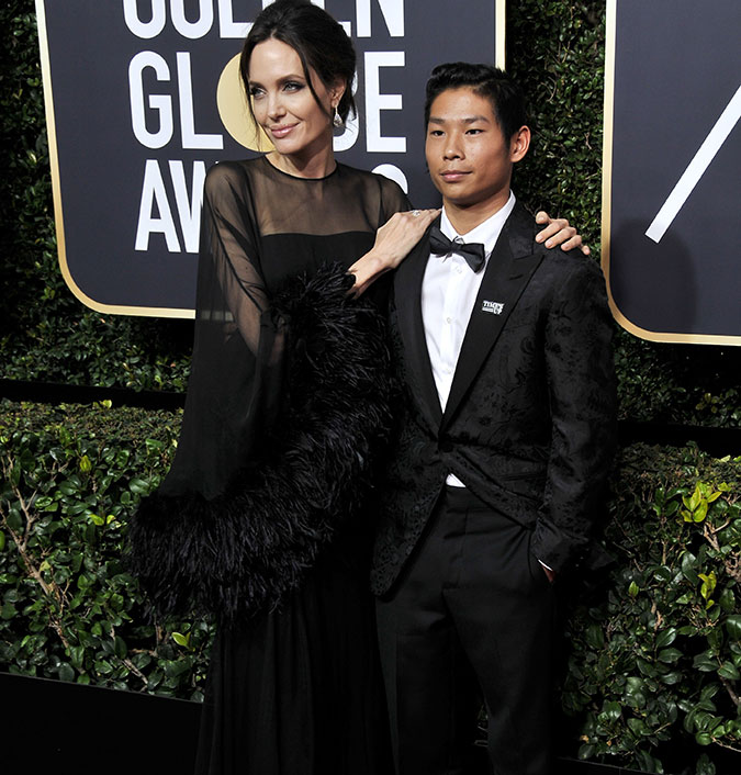 Durante divórcio, Angelina Jolie teria dito a filho que Brad Pitt nunca quis adotá-lo