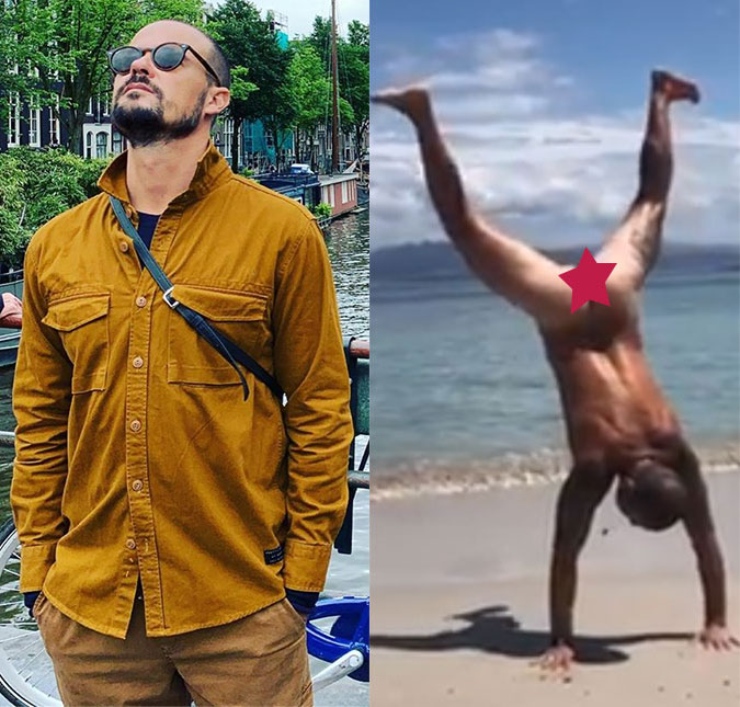 Durante viagem à Europa, Paulinho Vilhena posta vídeo pelado fazendo acrobacias na praia