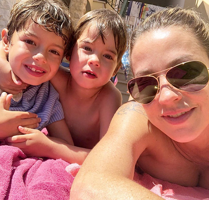 Vivendo polêmica com ex-marido, Luana Piovani aproveita dia de sol com os filhos e manda indireta: <i>Muito bem acompanhada</i>