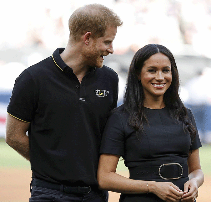 Príncipe Harry teria ignorado Meghan Markle durante partida de beisebol, diz jornal