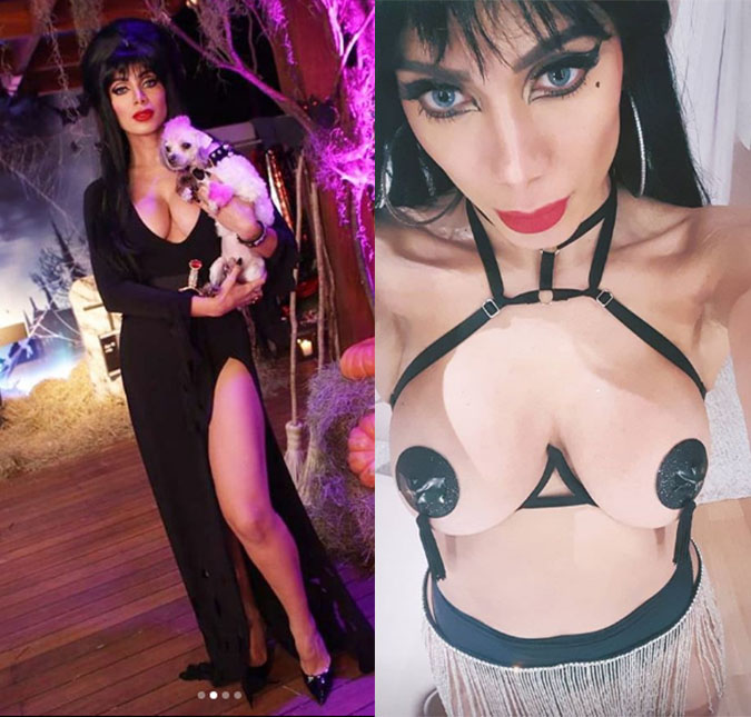 Fantasiada de Elvira, Anitta dá festão de Halloween repleto de famosos e fica com os seios de fora, assista!