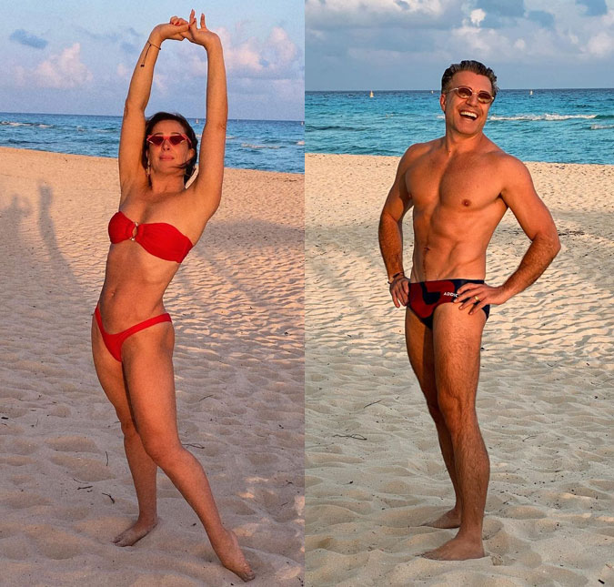 Claudia Raia e o marido, Jarbas Homem de Mello, mostram boa-forma na praia e ele elogia: <i>Esse peixão é meu!</i>