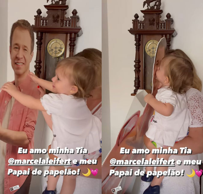 Filha de Tiago Leifert abraça e beija papelão com imagem do pai