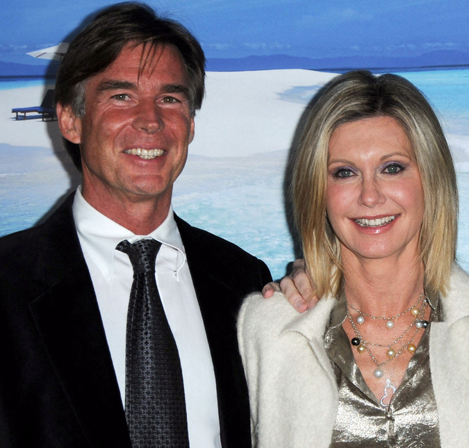 Marido de Olivia Newton-John escreve carta aberta para atriz e declara: <i>Mulher mais corajosa que eu já conheci</i>