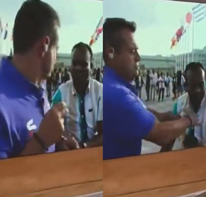 Cobrindo a Copa do Mundo no Catar, jornalista Eric Faria empurra homem em entrada ao vivo no jornal