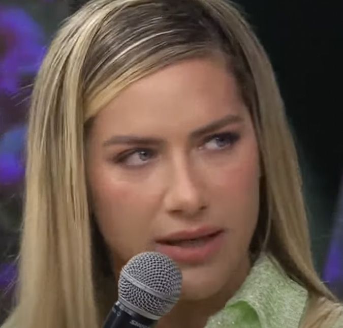 A atriz parece estar torcendo para Fred Nicácio