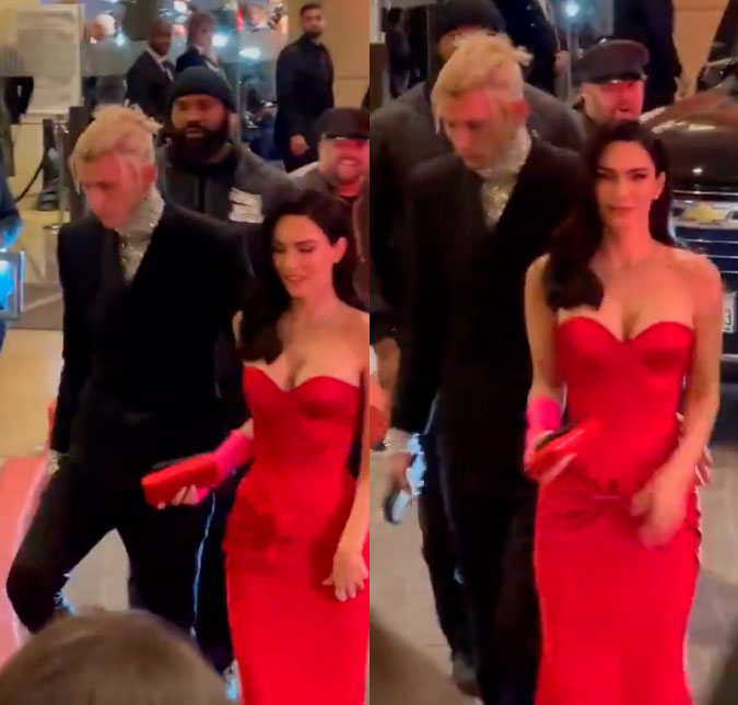 Megan Fox chega no <i>Grammy 2023</i> com pulso fraturado e vestido vermelho decotado
