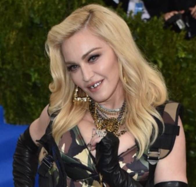 Madonna teria terminado relacionamento devido à crise de confiança, diz fonte O relacionamento da cantora e de Andre Darnell foi abalado pelas críticas que Madonna recebeu