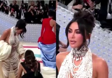 Kim Kardashian quase toma tombo após seu vestido de pérolas do <i>MET Gala</i> se desfazer