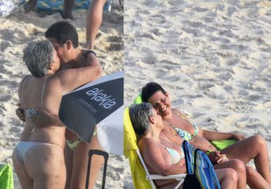 Claudia Rodrigues e Adriane Bonato curtem dia de praia e trocam carinhos