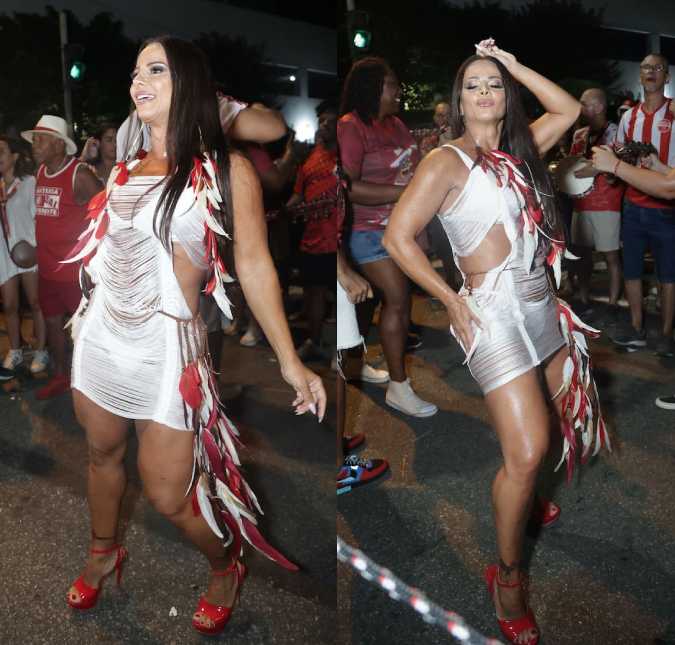 Viviane Araújo usa vestidinho de rede e plumas para ensaio de rua do Salgueiro
